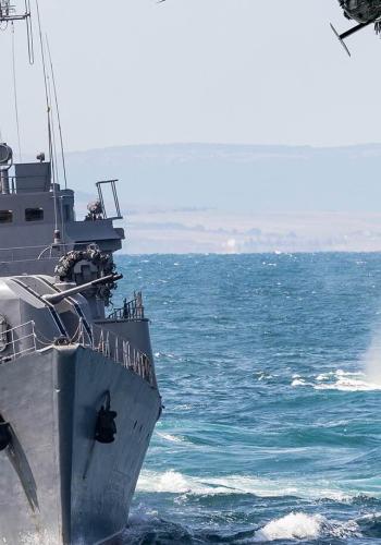 Maritime and naval operations using stabilized line-of-sight optical communication terminals